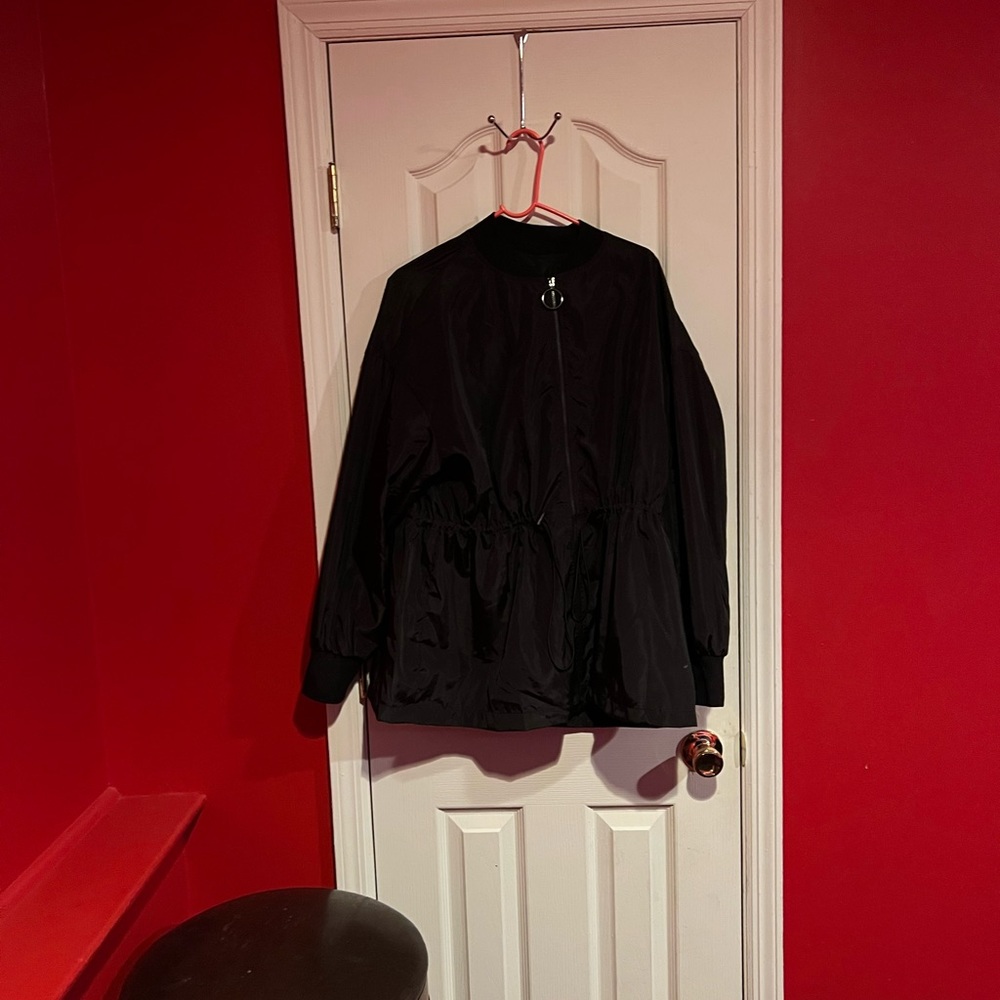 Black windbreaker